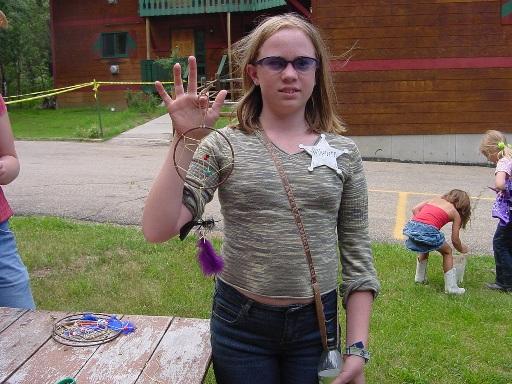 Sissy Here's Savannah with the Dream Catcher she made on her own.